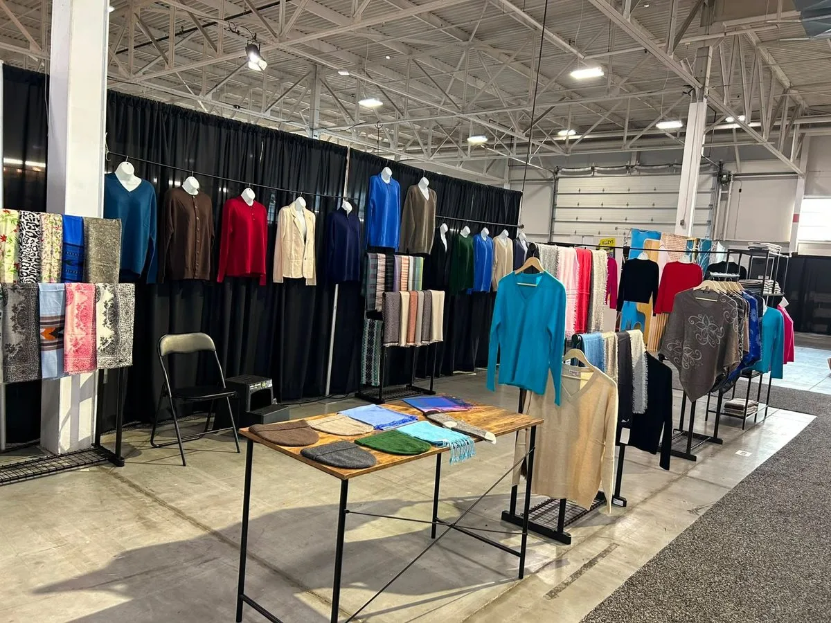 Full display of authentic Himalayan pashmina shawls, stoles and cashmere sweaters at New Himalayan Pashmina House Toronto exhibition
