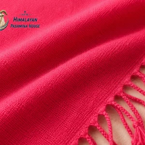 Close-up of fine weave texture on handwoven pink pashmina stole