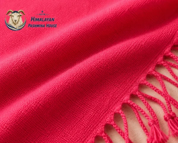 Close-up of fine weave texture on handwoven pink pashmina stole